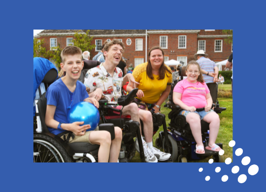 Group of individual wheelchair users pictured with support workers